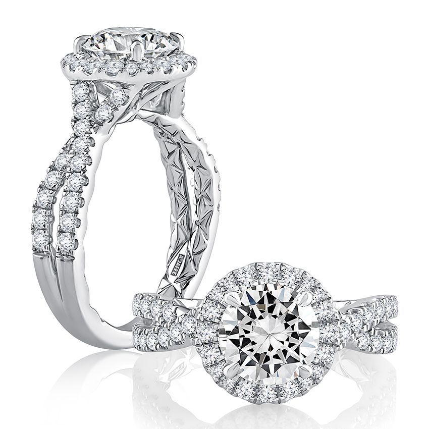 Round diamond engagement ring with diamond halo and diamond twist band