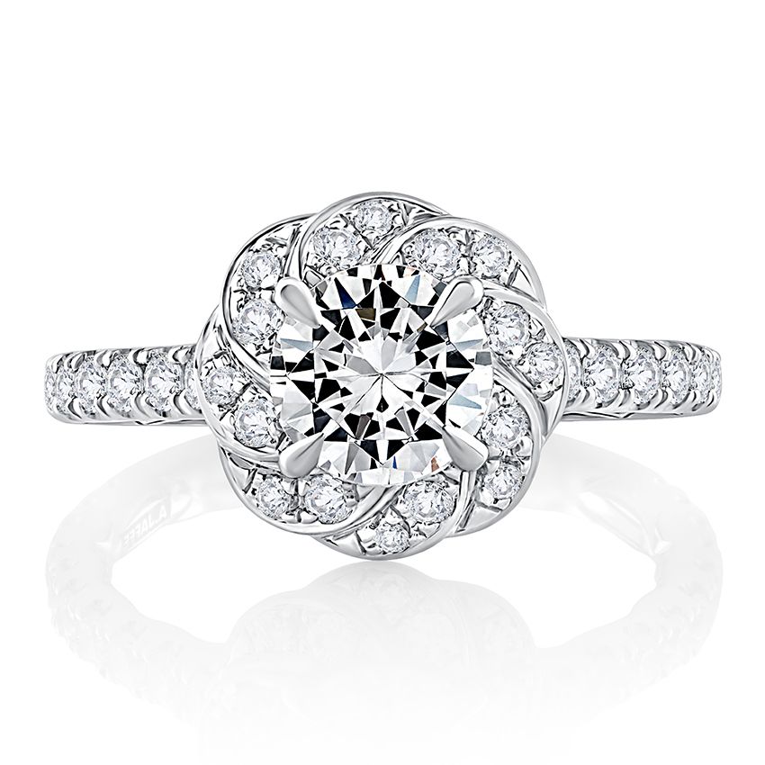 Round diamond center engagement ring with twisted diamond halo and diamonds down shank